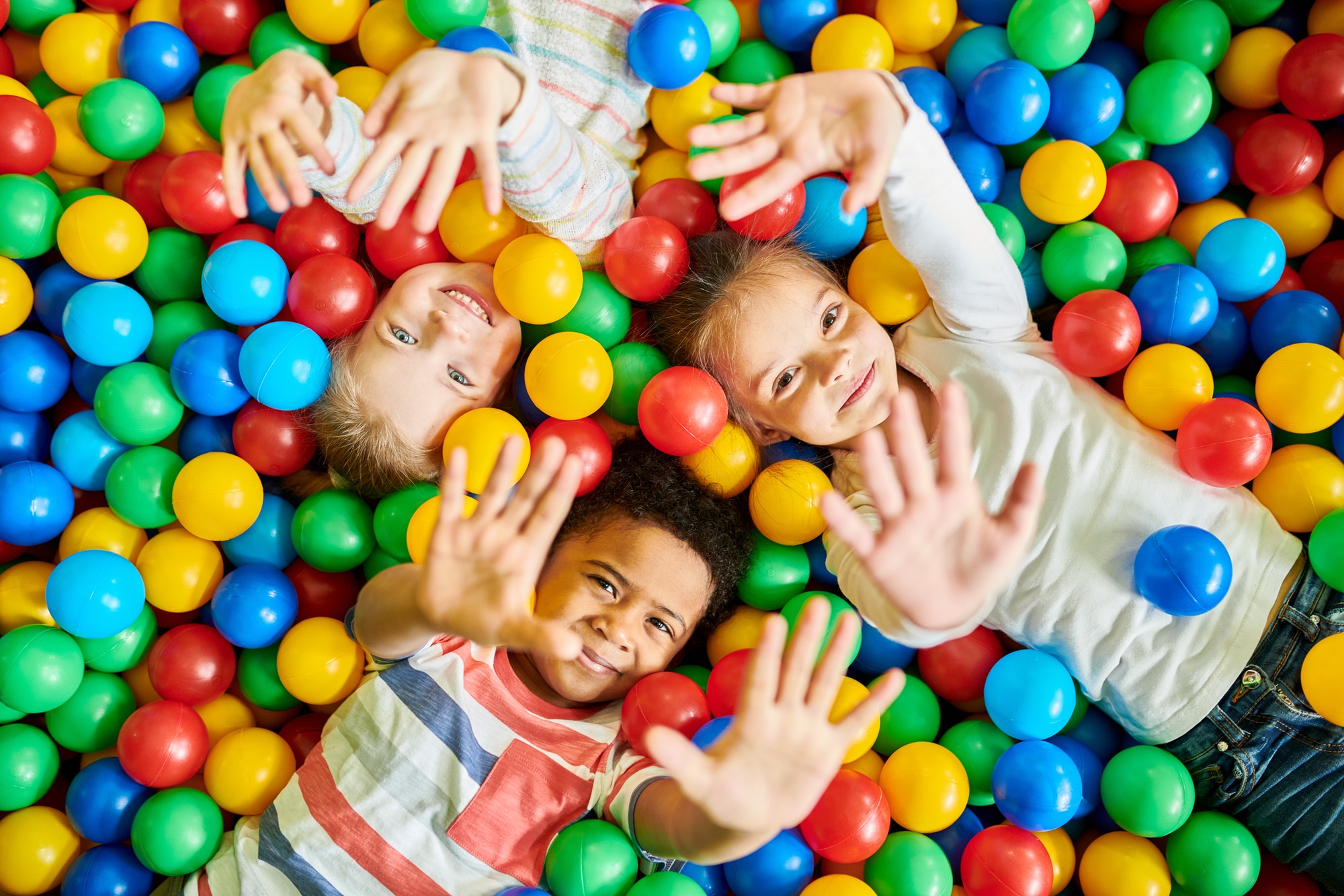 three-kids-playing-in-ballpit.jpg